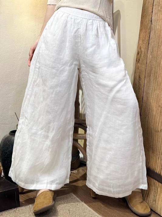summer White top for a breezy, elegant look.