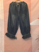 Femme d'été classique en denim décontracté et plissé de fond