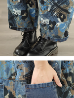 abstract printed denim overalls with rolled cuffs and pockets