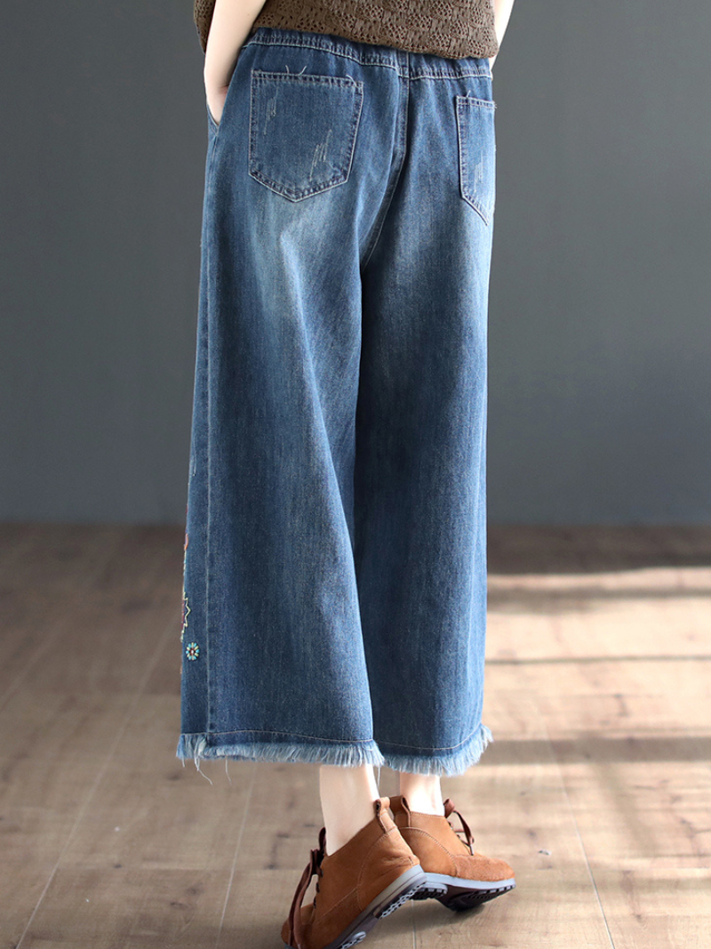 Le pantalon de fond élastique de denim pour femmes du cœur perdu
