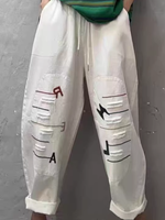 Chic Cotton Drawstring Tapered Pants with Artful Slashes for Women