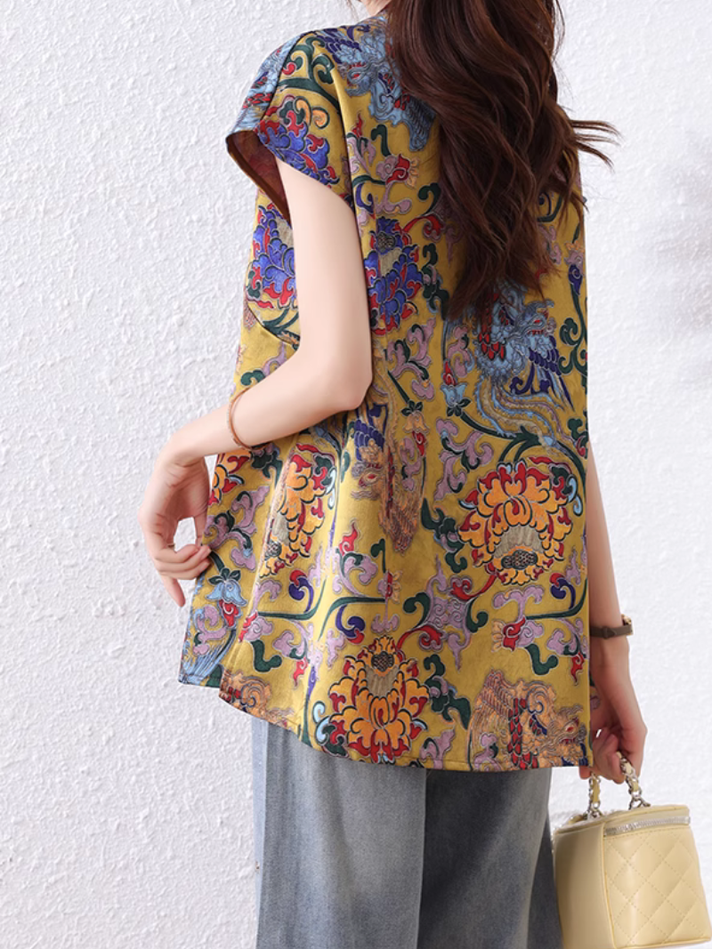 Women wearing a colorful floral top 
