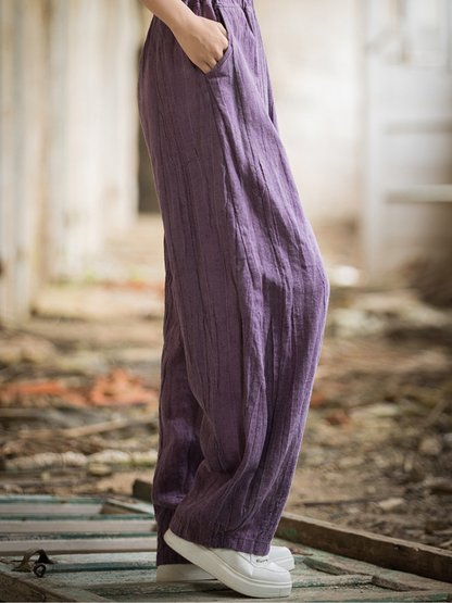  wearing purple pants 