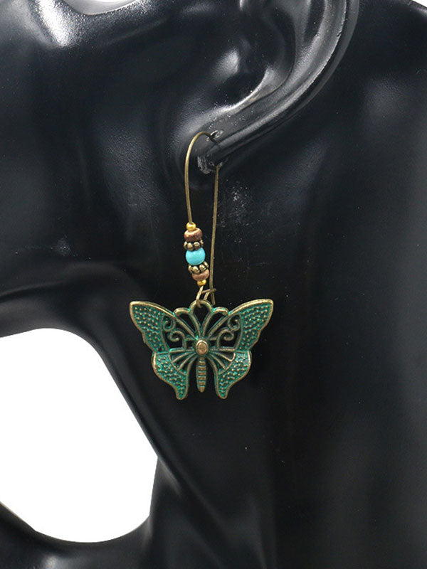 Canto de pendientes de mariposas de alas