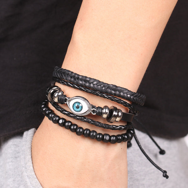 Brazalete de ojo malvado de cuero trenzado negro
